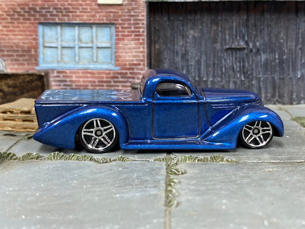 Hot Wheels Super Smooth metallic blue loose car — right side view