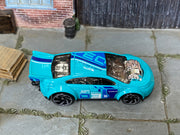 Hot Wheels Super Volt turquoise 2024 X6999 loose car, top view