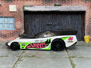 White green and pink number 44 Hot Wheels Supercharged loose car, left side view