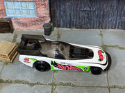 White green and pink number 44 Hot Wheels Supercharged loose car, top view