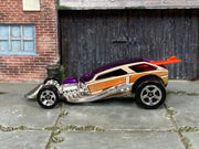 Hot Wheels Surf Crate purple with woodgrain graphics and orange-red surfboard, left side view