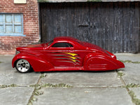 Hot Wheels Swoop Coupe metallic red with yellow and silver graphics, left side view