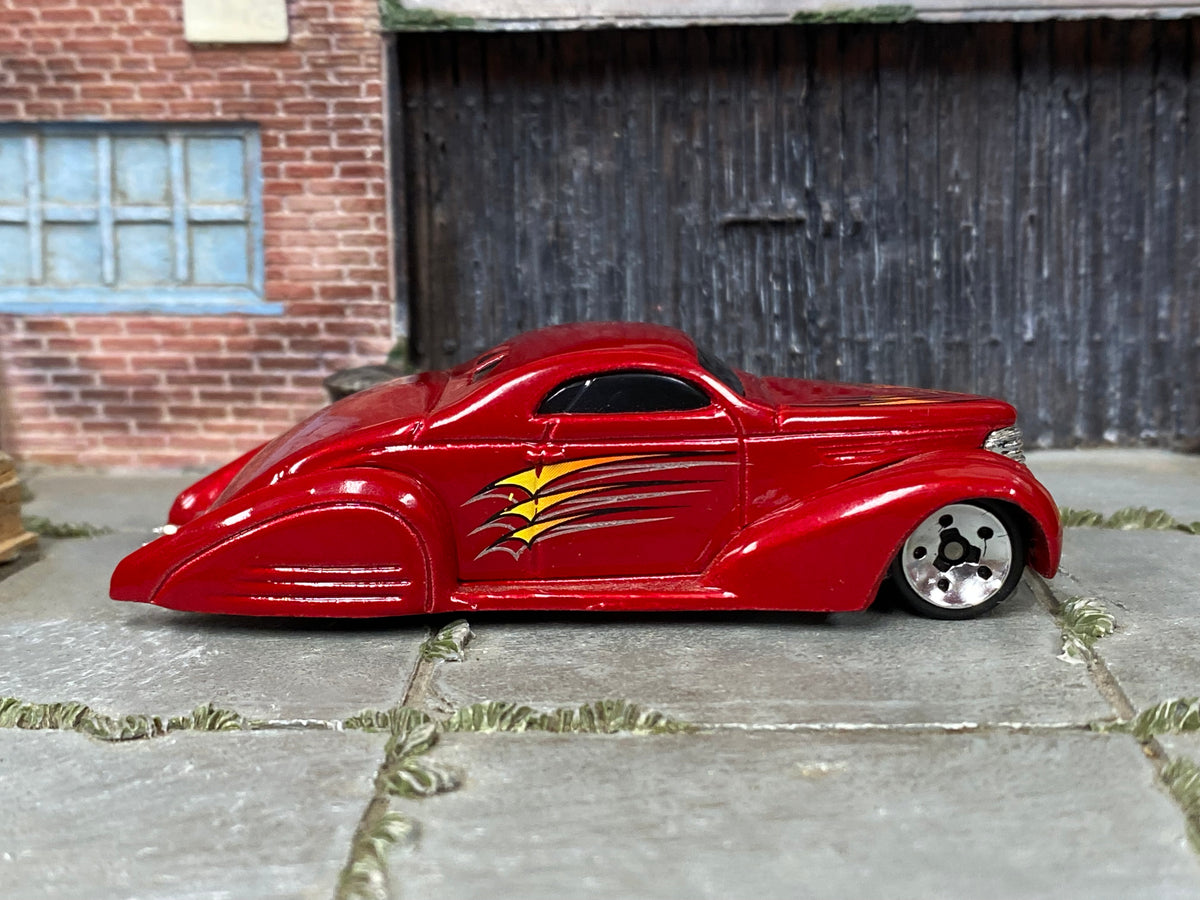 Hot Wheels Swoop Coupe metallic red with yellow and silver graphics, right side view