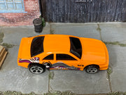 Hot Wheels T-Bird Stocker 1998 orange Xtreme graphics, top view