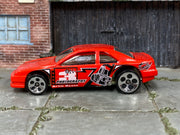 Hot Wheels T-Bird Stocker red On 3 Photography Artie Scott, left side view