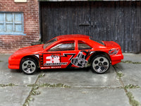 Hot Wheels T-Bird Stocker red On 3 Photography Artie Scott, left side view