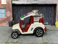 Hot Wheels Tee'd Off pearl white with burgundy interior — left side view
