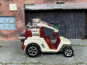 Hot Wheels Tee'd Off pearl white with burgundy interior — right side view