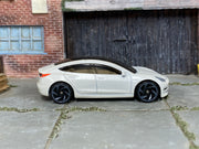 Hot Wheels Tesla Model 3 pearl white loose car, right side view