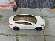 Hot Wheels Tesla Model 3 pearl white loose car, top view