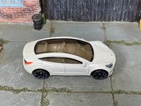 Hot Wheels Tesla Model 3 pearl white loose car, top view
