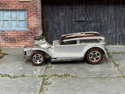 Hot Wheels The Demon silver with black Redlines roof graphic, left side view