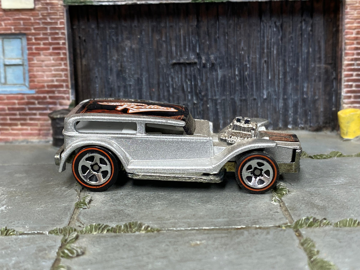 Hot Wheels The Demon silver with black Redlines roof graphic, right side view