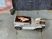 Hot Wheels The Demon silver with black Redlines roof graphic, top view