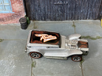 Hot Wheels The Demon silver with black Redlines roof graphic, top view