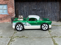 Hot Wheels The Nash metallic green and white loose car, left side view