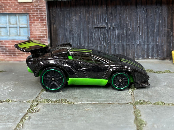 Hot Wheels Lamborghini Countach Tooned black and green loose car, right side view