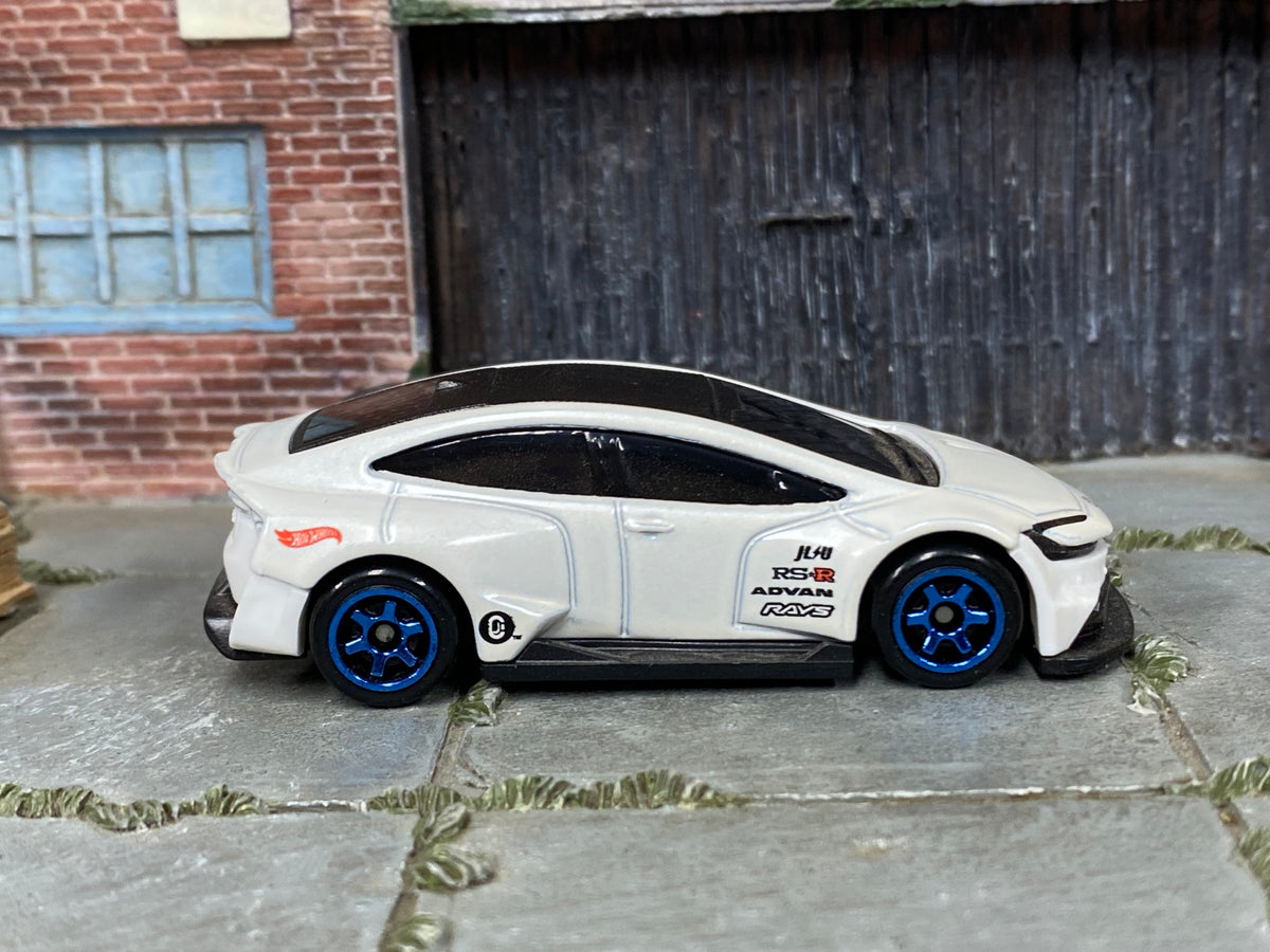 Hot Wheels Toyota Prius Custom pearl white with blue wheels, right side view