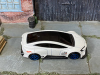 Hot Wheels Toyota Prius Custom pearl white with blue wheels, top view