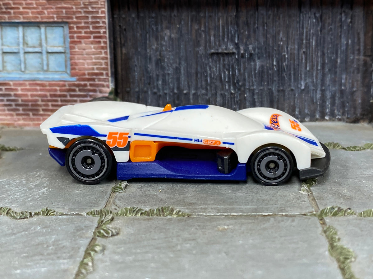 Hot Wheels Turbine Sublime white and blue 55, right side view showing loose-car wear