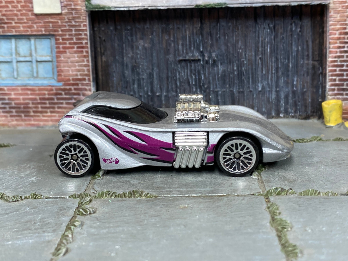 Hot Wheels Twin Mill II in silver with magenta graphics, right side view