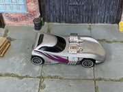 Hot Wheels Twin Mill II in silver with magenta graphics, top view