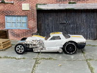 Hot Wheels Way 2 Fast white and yellow variation-pending loose car, left-side view