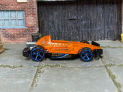 Hot Wheels What-4-2 translucent orange 2004 C2730 loose car, left-side view