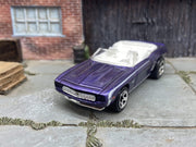 Loose Hot Wheels 1969 Chevy Camaro Convertible In Purple and White — view 4