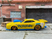 Loose Hot Wheels: 2010 Pro-Stock Chevy Camaro Drag Car - Yellow Pictionary Livery — view 3