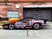 Loose Hot Wheels Pro Stock Pontiac Firebird in Black and Orange Kaboom Livery