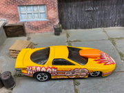 Loose Hot Wheels Pro Stock Pontiac Firebird Dressed in Yellow and Orange Kaboom Livery — view 2