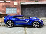 Loose Hot Wheels Chevy Corvette C7 Z06 Dressed in Blue and White — view 3