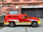 Loose Hot Wheels Dodge Ram 1500 Camper Shell Truck In Red, White and Yellow — view 3