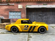 Loose Hot Wheels Nissan Fairlady 2000 - Yellow and Black 2 — view 3