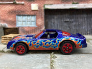 Loose Hot Wheels Pontiac Firebird in Blue and Red with Flames T-Tops — view 3