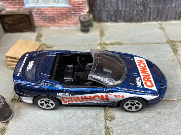 Loose Hot Wheels 1995 Camaro Convertible Dressed in Blue Nestle Livery — view 2