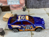 Loose Hot Wheels - Ford Escort Rally - Blue and Orange #71 Race Livery — view 2
