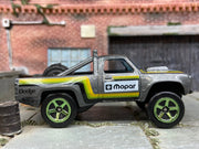 Loose Hot Wheels 1987 Dodge D100 Baja Race Truck In MOPAR Gray Race Livery — view 3