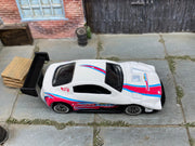 Loose Hot Wheels Pikes Peak Toyota Celica Race Car - White, Pink and Blue SweetTarts — view 2