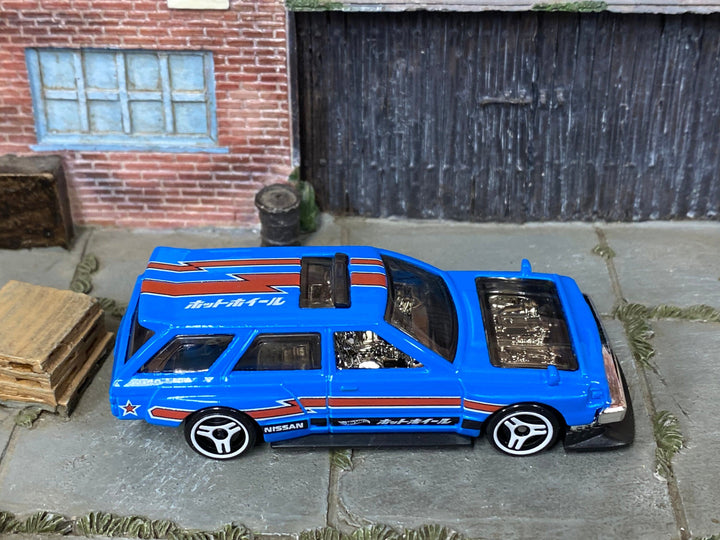 Loose Hot Wheels - Nissan Maxima Drift Car - Blue and Red — view 2