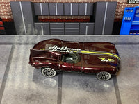 Loose Hot Wheels - Jaguar D-Type - Dark Red and Gold Huffman Hawks — view 2