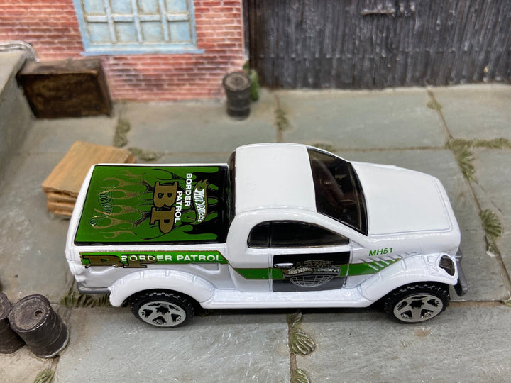 Loose Hot Wheels Dodge Power Wagon 4x4 Truck In Border Patrol Green and White — view 2