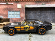 Loose Hot Wheels 1967 Pontiac Firebird in Satin Black and Orange #67 Livery — view 3