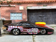 Loose Hot Wheels Pro Stock Pontiac Firebird Dressed in Black and Orange Kaboom Livery — view 3