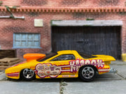 Loose Hot Wheels Pro Stock Pontiac Firebird Dressed in Yellow and Orange Kaboom Livery — view 3