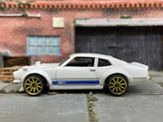 Loose Hot Wheels Custom Ford Maverick Dressed in White and Blue — view 3