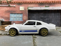 Loose Hot Wheels Custom Ford Maverick Dressed in White and Blue — view 3