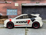 Loose Hot Wheels Ford Focus RS Dressed in Koni White Livery — view 3