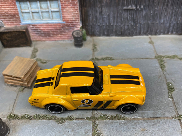 Loose Hot Wheels Nissan Fairlady 2000 - Yellow and Black 2 — view 2